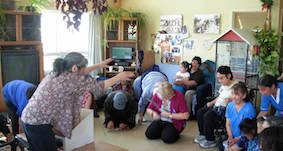 Photo 4: parlaniq – Kuujjuaq Elders rush to get candy, June 16 2014.